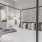 Large, open bedroom with queen size bed.